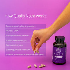 Qualia Night Sleep Aid in use on a bedside table at night.