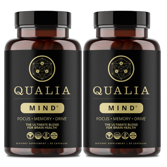 Qualia Mind bottle closeup with capsules that may support focused work.