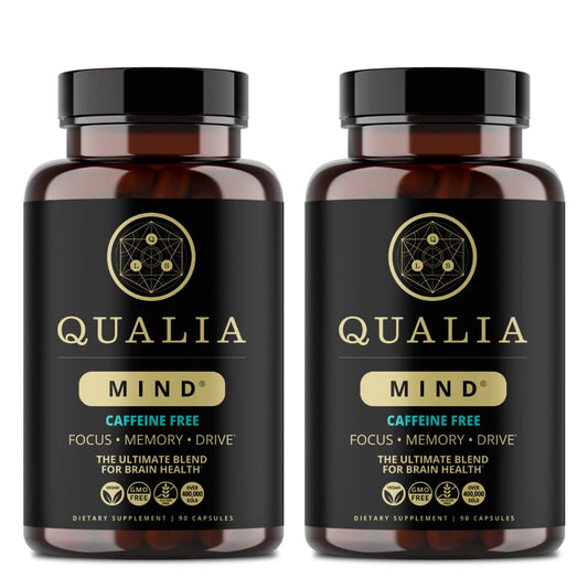 Qualia Mind caffeine free bottle on desk, supporting focused work and daily productivity