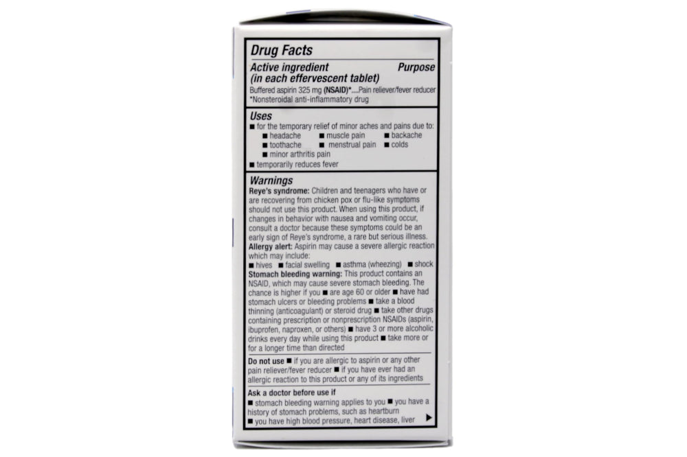 Quality Choice effervescent tablets dissolving in a tall glass of water ready to drink.