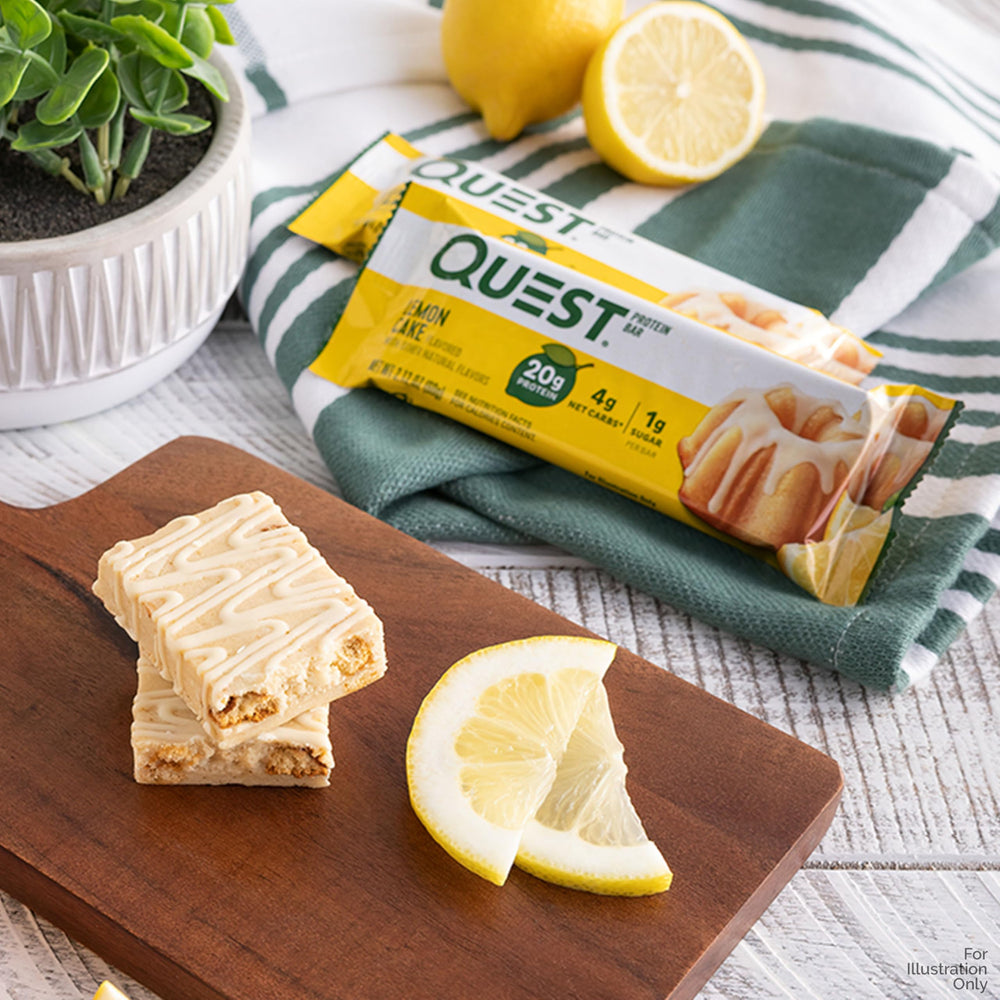 Close-up of Quest protein bar packaging showing 20g protein and low sugar per bar.