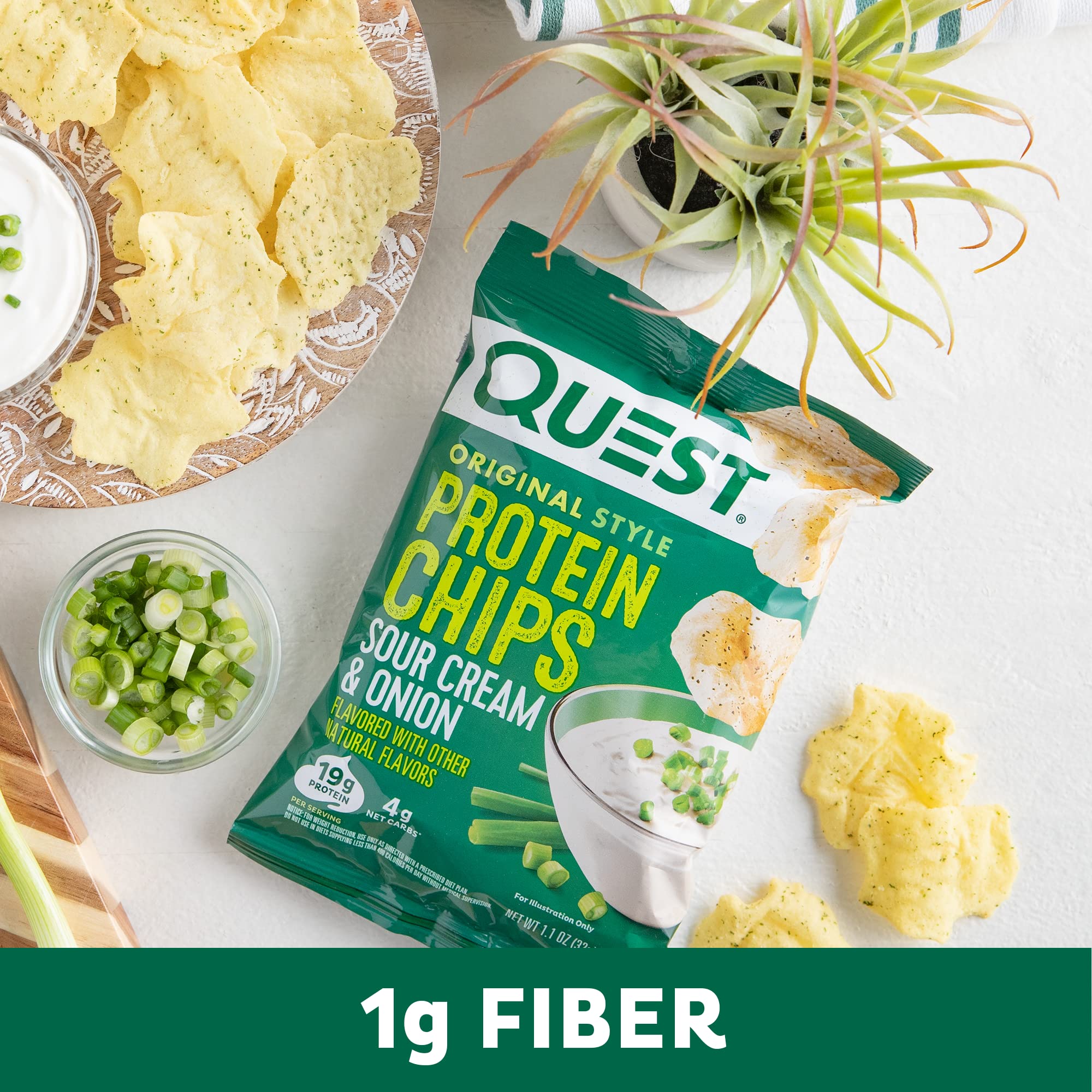Quest Sour Cream & Onion chips beside a gym water bottle ready for a gym break.