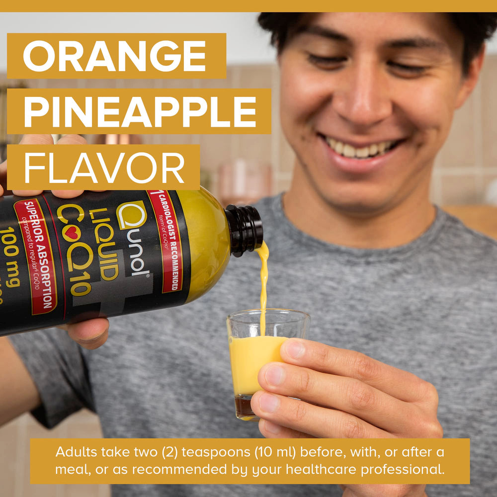 Qunol liquid CoQ10 bottle with glass ready for hydration