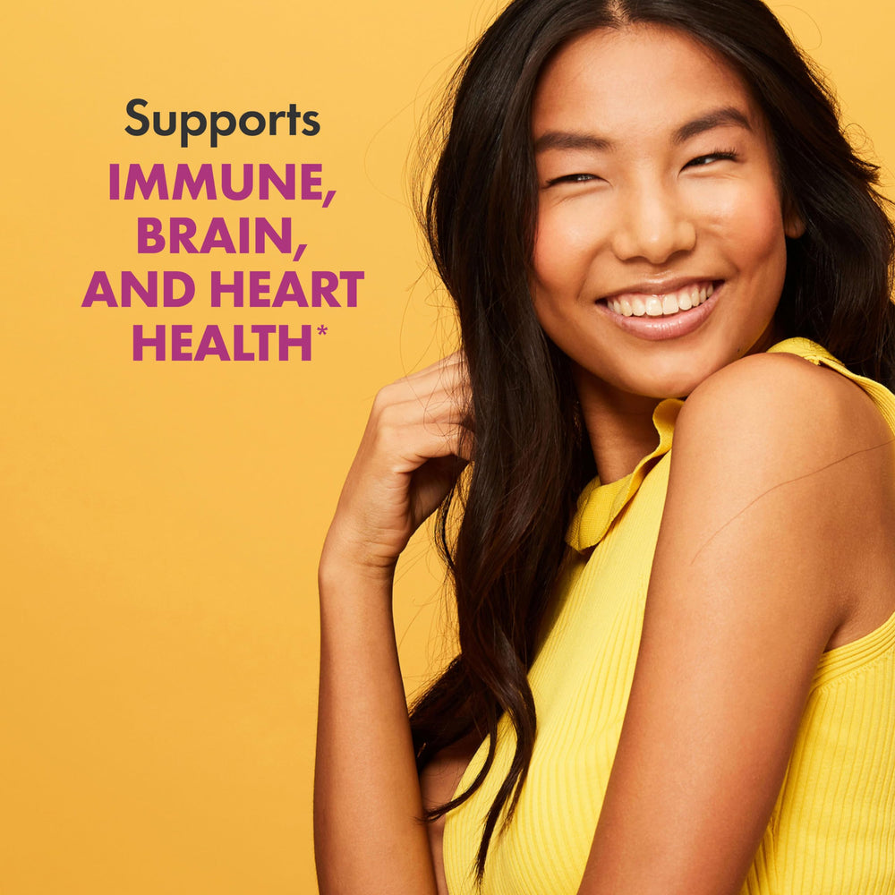 Rainbow Light Women's One powder mixed into water for a quick daily boost.