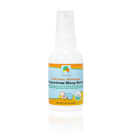 Raise Them Well magnesium sleep serum pump applied between the child's shoulders for calm.