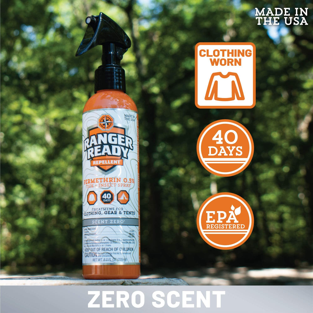 Treating outdoor gear with Ranger Ready Permethrin Spray on sleeping bag and tent.