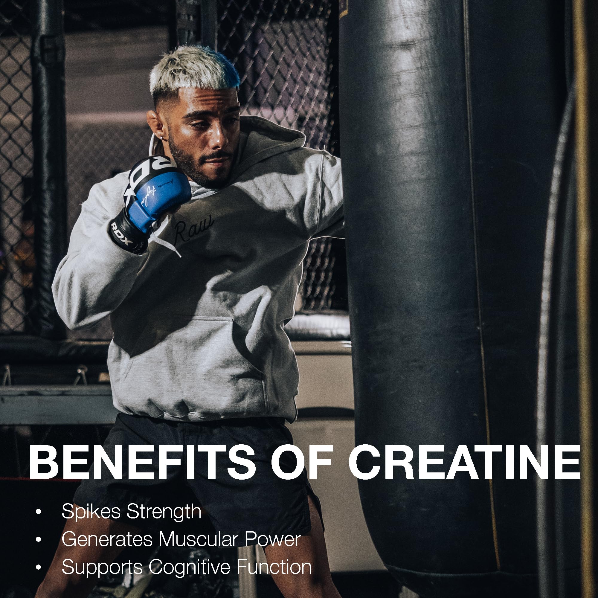 RAW Nutrition creatine monohydrate powder jar with scoop illustrates daily serving.