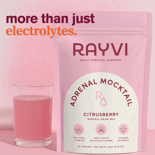 Rayvi Adrenal Electrolytes Powder pour into glass shows caffeine-free refreshment.