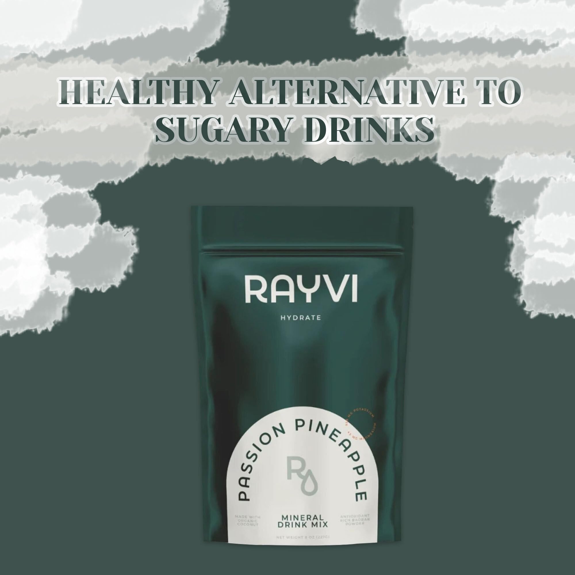 Rayvi glass with bright pineapple drink illustrates refreshing electrolyte hydration.