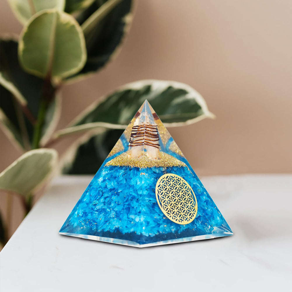 Real Crystal Aquamarine Orgonite Pyramid meditation scene on desk for focus