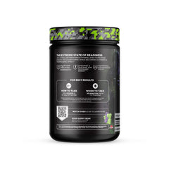 REDCON1 Total War Black Ops scoop beside a glass ready to mix preworkout