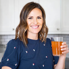 Redmond Re-Lyte Mango glass with powder highlights refreshing beverage mix.