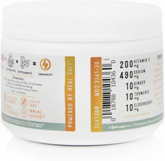 Scoop of Re-Lyte Immunity ready to mix with water for daily use