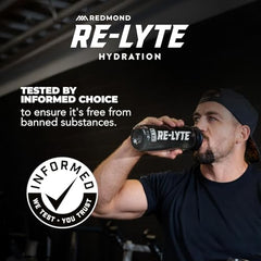 Glass of Redmond Re-Lyte Mixed Berry with ice ready to drink.