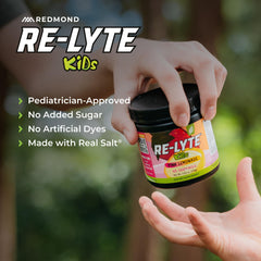 REDMOND Re-Lyte Kids pink lemonade color water with natural fruit accents.