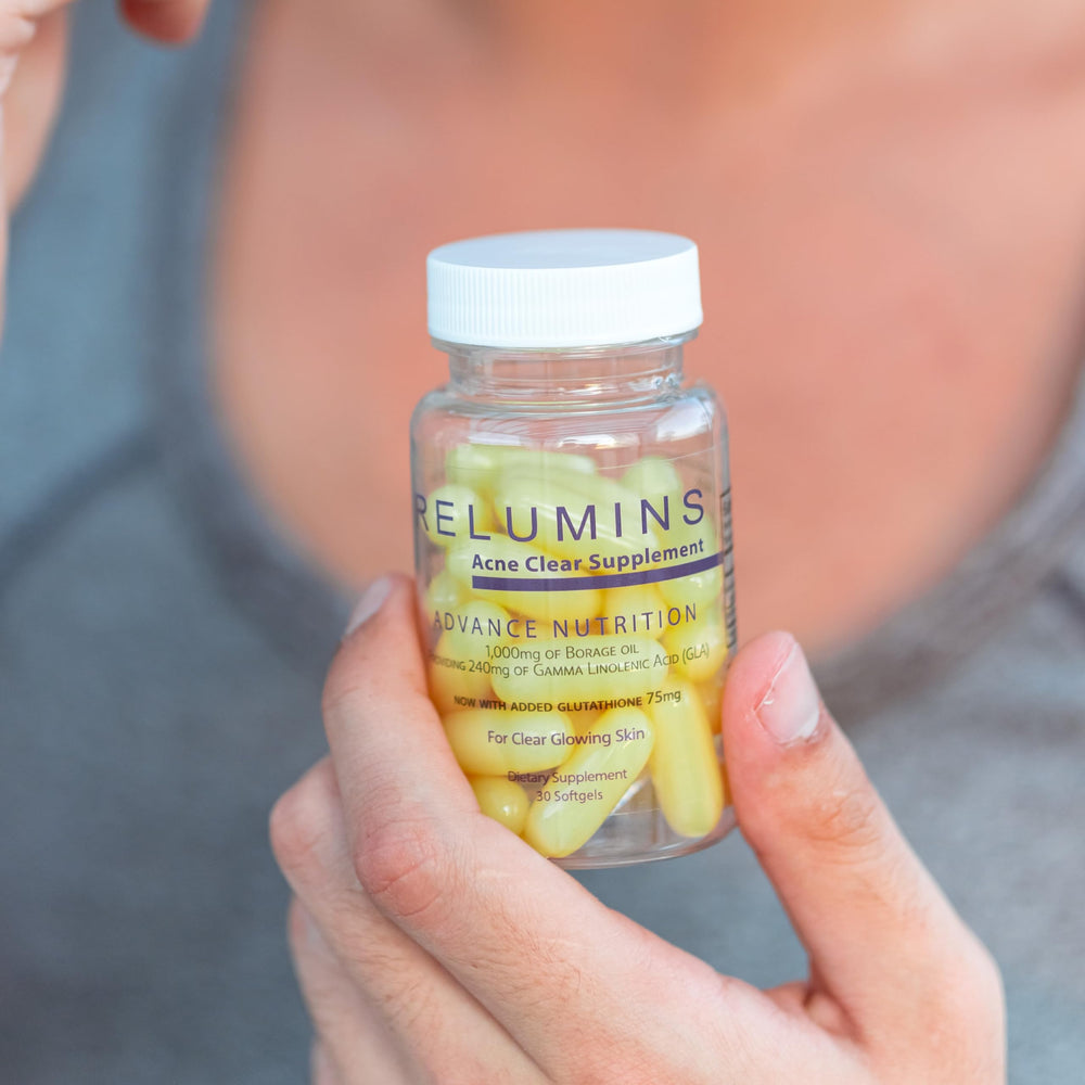 Relumins packaging box highlighting Self-Love Essential concept and plant-based formula.