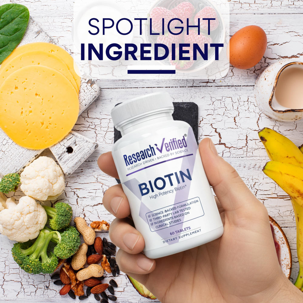 Research Verified Biotin bottle on desk as part of routine.