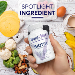 Research Verified Biotin bottle on desk as part of routine.