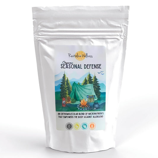 Revitalize Wellness Seasonal Defense Powder bottle for daily immune support.