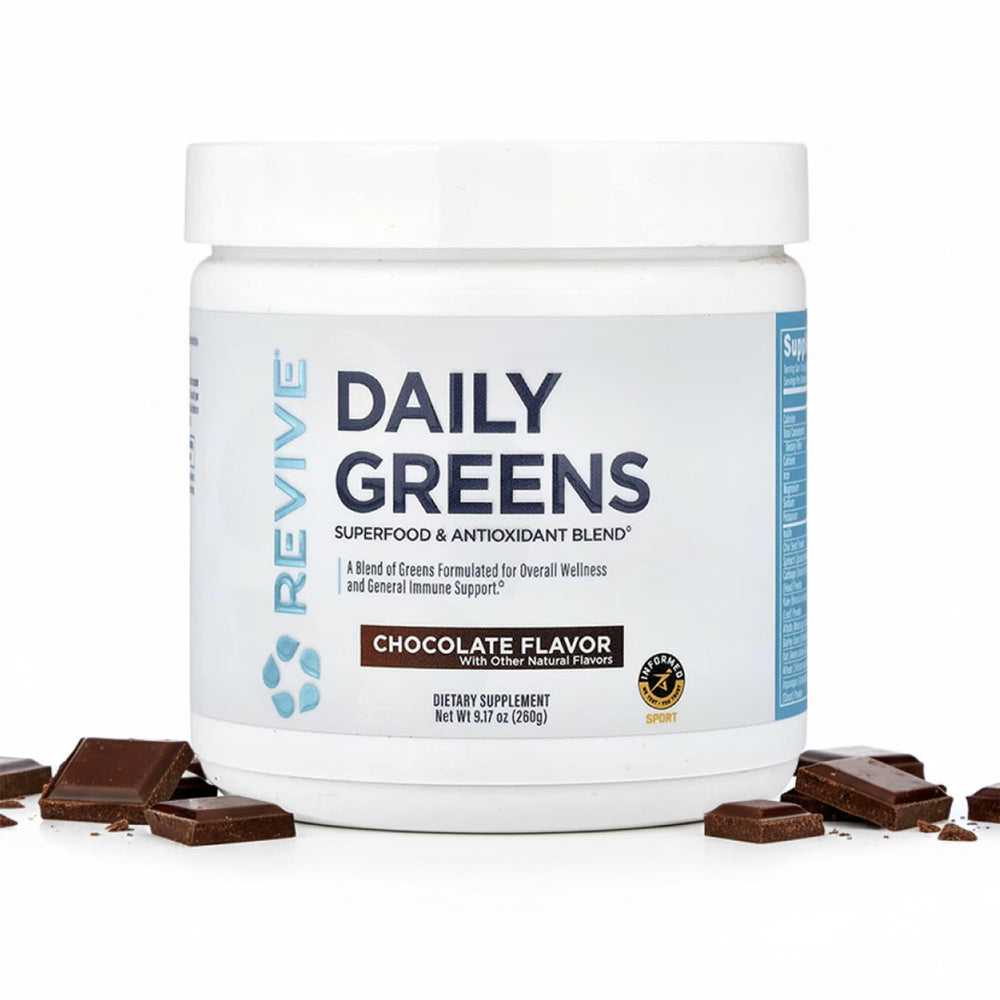 Revive MD Daily Green Powder chocolate bottle on kitchen counter for daily nutrition.