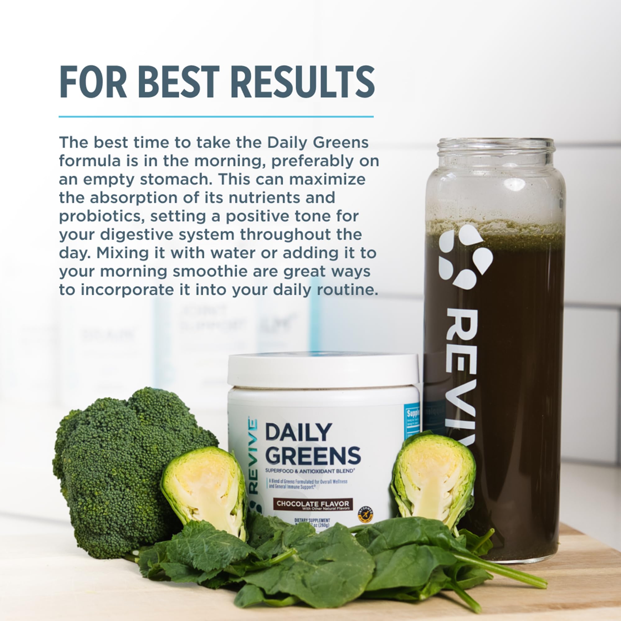 Glass of Revive MD Daily Green Powder chocolate smoothie.