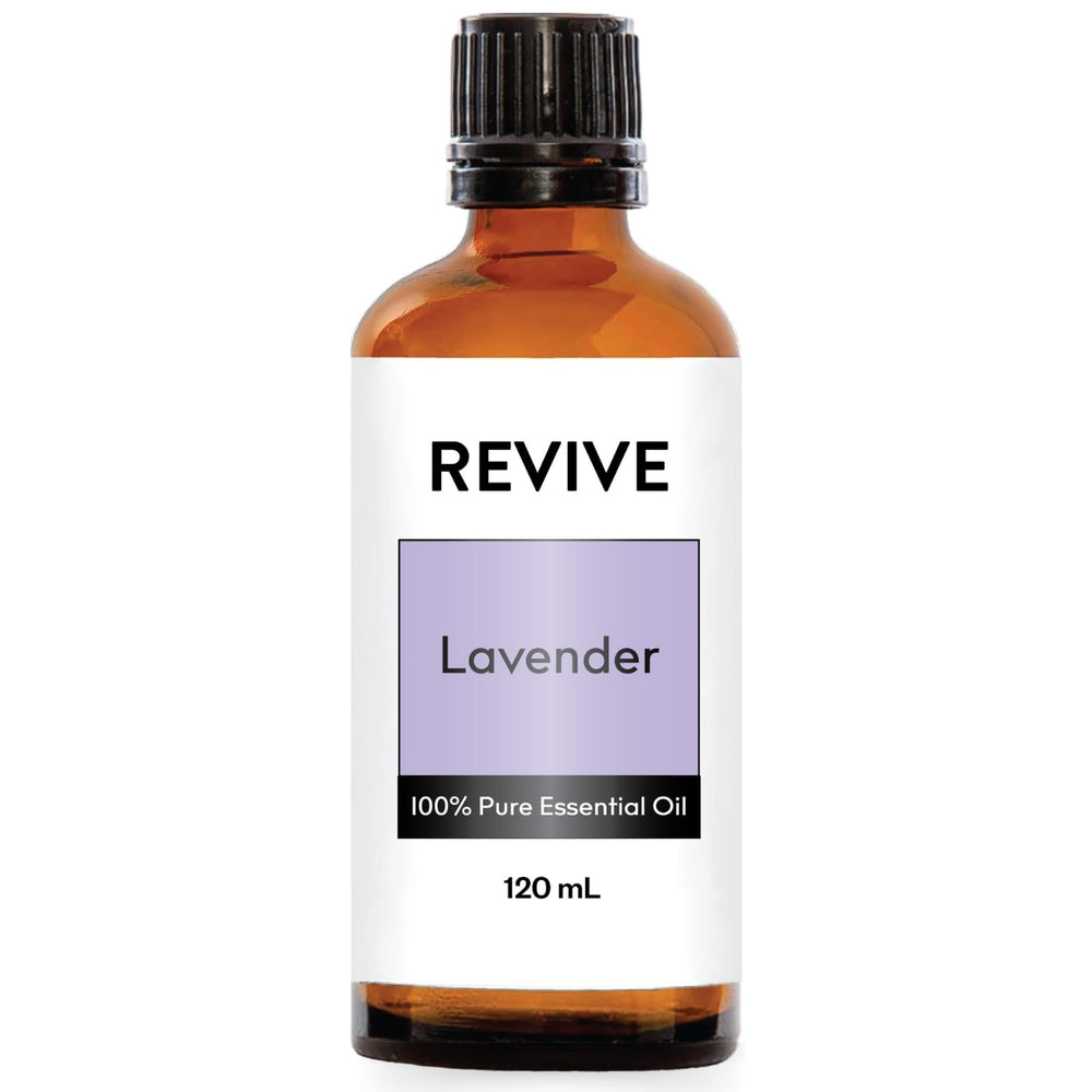 REVIVEEO Lavender oil bottle beside diffuser for calming aromatherapy.