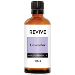 REVIVEEO Lavender oil bottle beside diffuser for calming aromatherapy.
