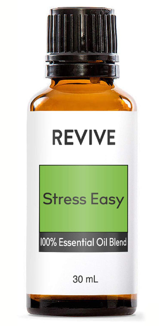 REVIVEEO Stress Easy bottle pour for a calm aromatherapy ritual.