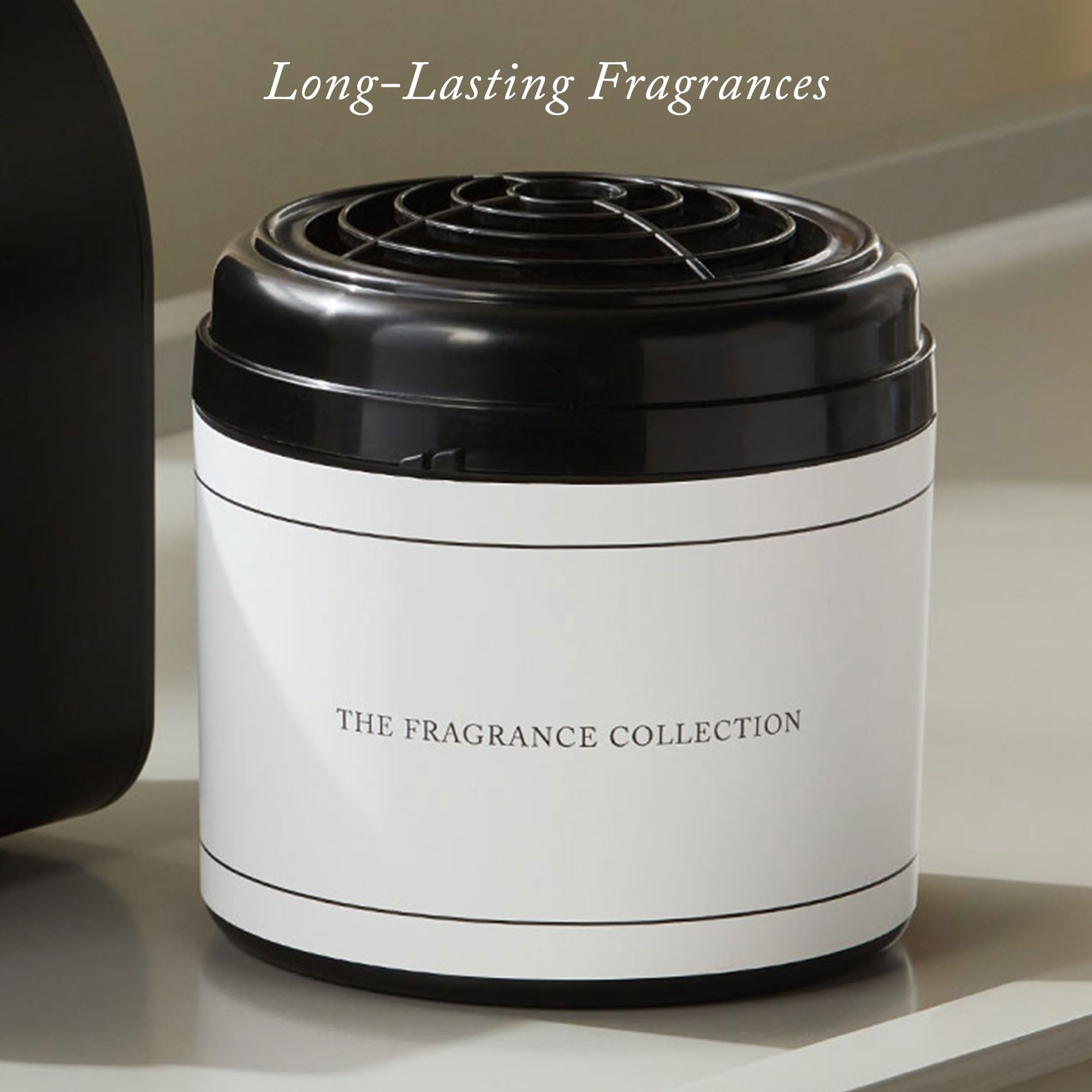 Close-up of The Ritz-Carlton cartridge highlighting dry air diffusion technology for mess-free fragrance.