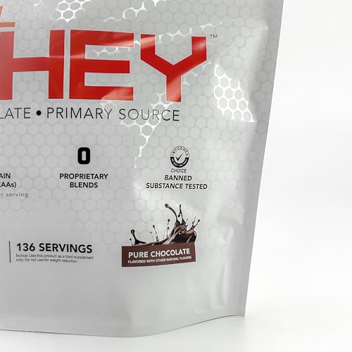 Scoop and pour of Clean Rival Whey powder for quick mixing