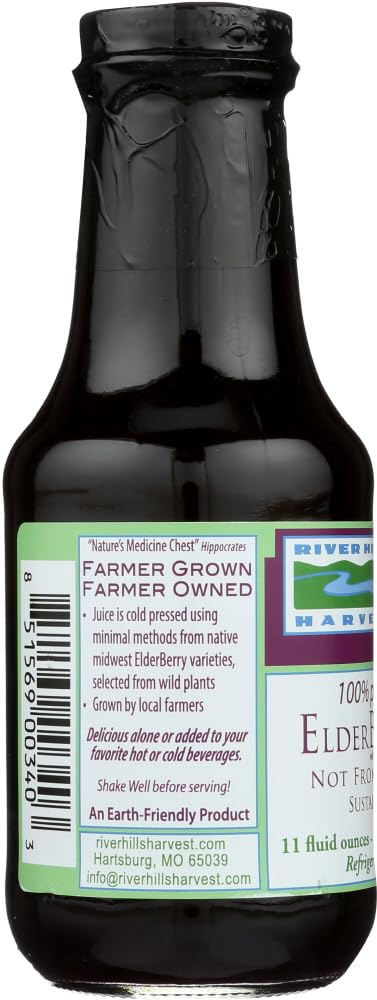 River Hills Harvest Elderberry Juice pour from bottle into glass, ready to enjoy.