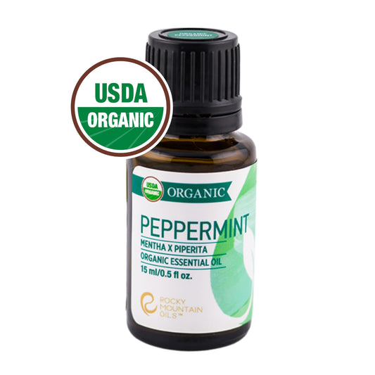 Rocky Mountain Oils peppermint oil in a diffuser promoting a refreshing aroma.