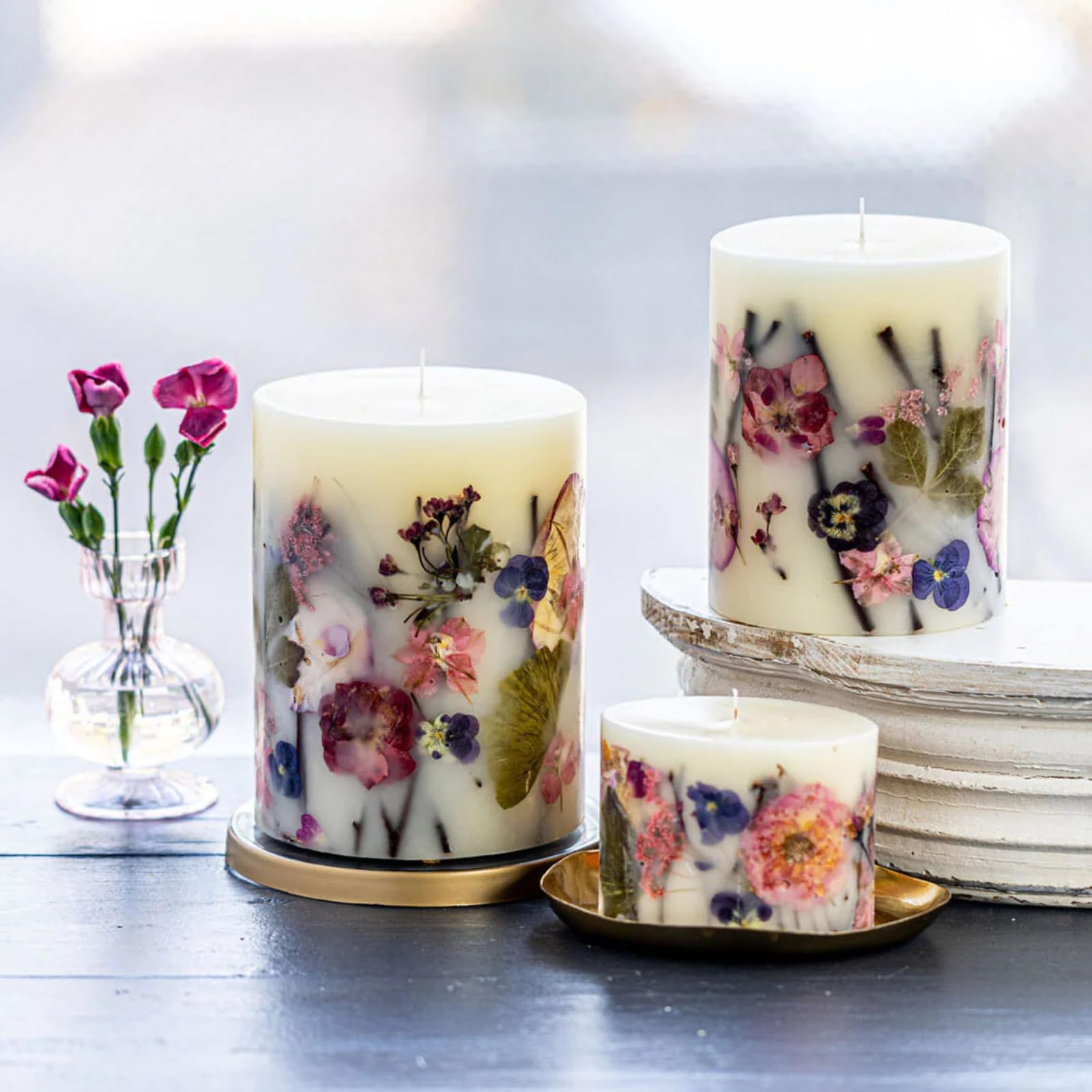 Rosy Rings Blushing Rosewood Candle illuminated glow in a cozy space