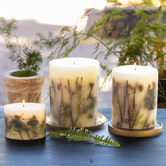 Rosy Rings Forest Round Candle highlights cedar and pine notes for a fresh mood.