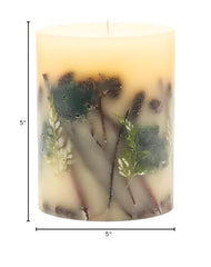 Rosy Rings Forest Round Candle in a glass vessel complements modern decor.