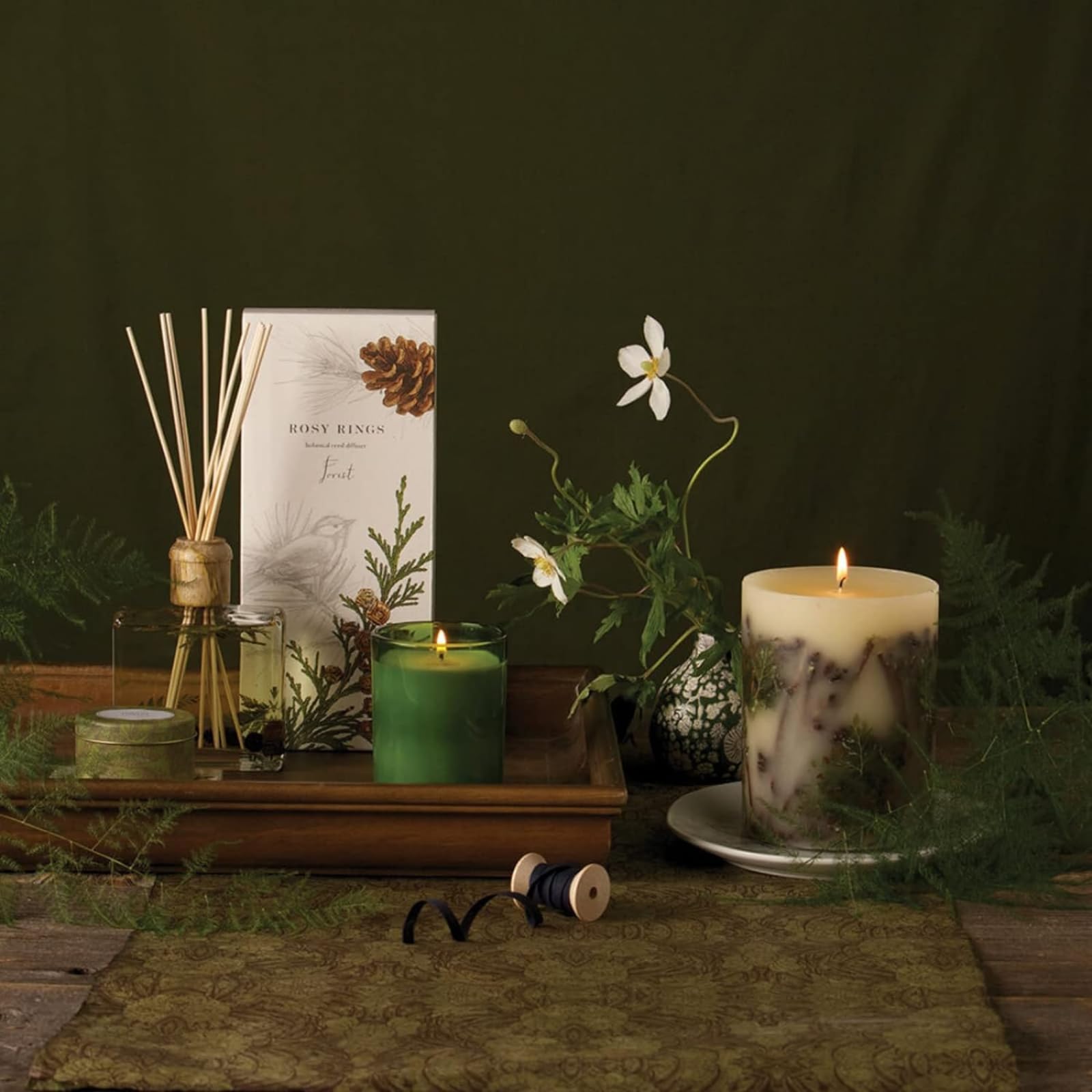 Rosy Rings Forest Round Candle evokes a misty woodland path in your home.