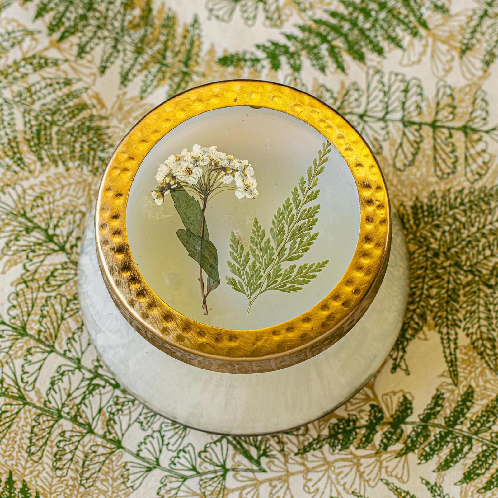 Rosy Rings pressed floral candle showing wax press highlights for a refined table centerpiece.