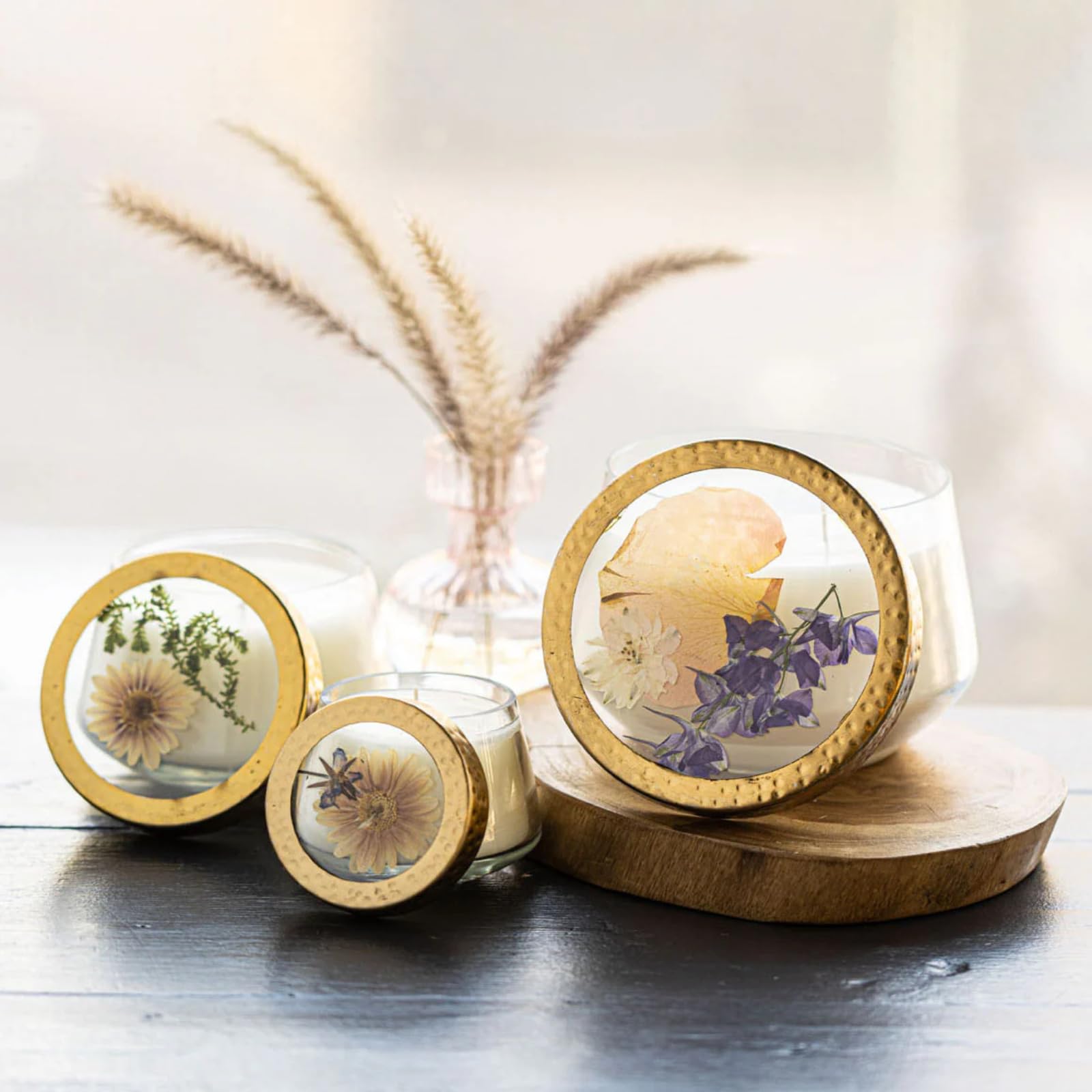 Vanilla Rain pressed botanicals close-up inside glass panes for a decorative fragrance display