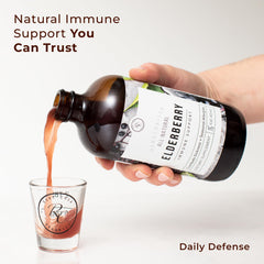 Rowe Casa Organics Elderberry Syrup on kitchen counter for daily use.