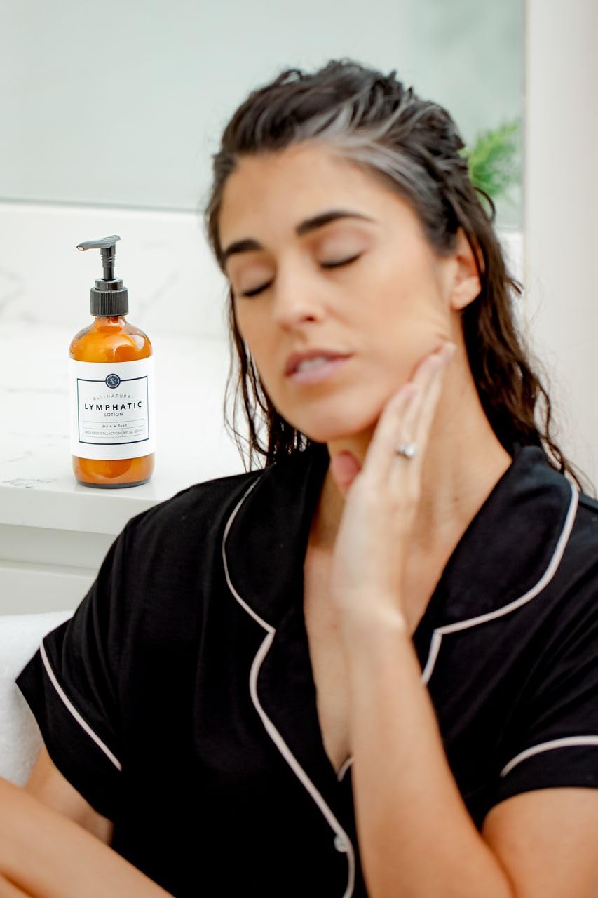 Wellness Collection bottle shown with essential oil blend for holistic routines.