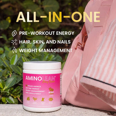 AminoLean Berry Elixir scoop ready for precise pre-workout serving and mixing.