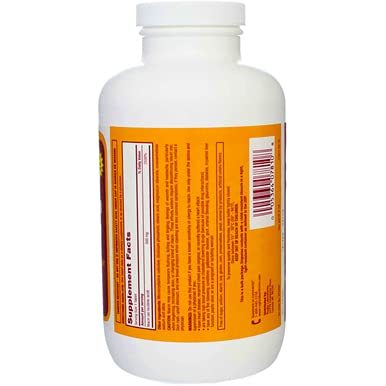 Side view of Rugby Niacin 500mg tablets with bottle in focus.