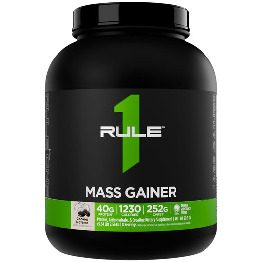Rule 1 Mass Gainer bottle close-up showing high-calorie formula for weight gain.