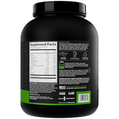 Rule 1 Mass Gainer scoop beside tub highlights 40g protein per serving.