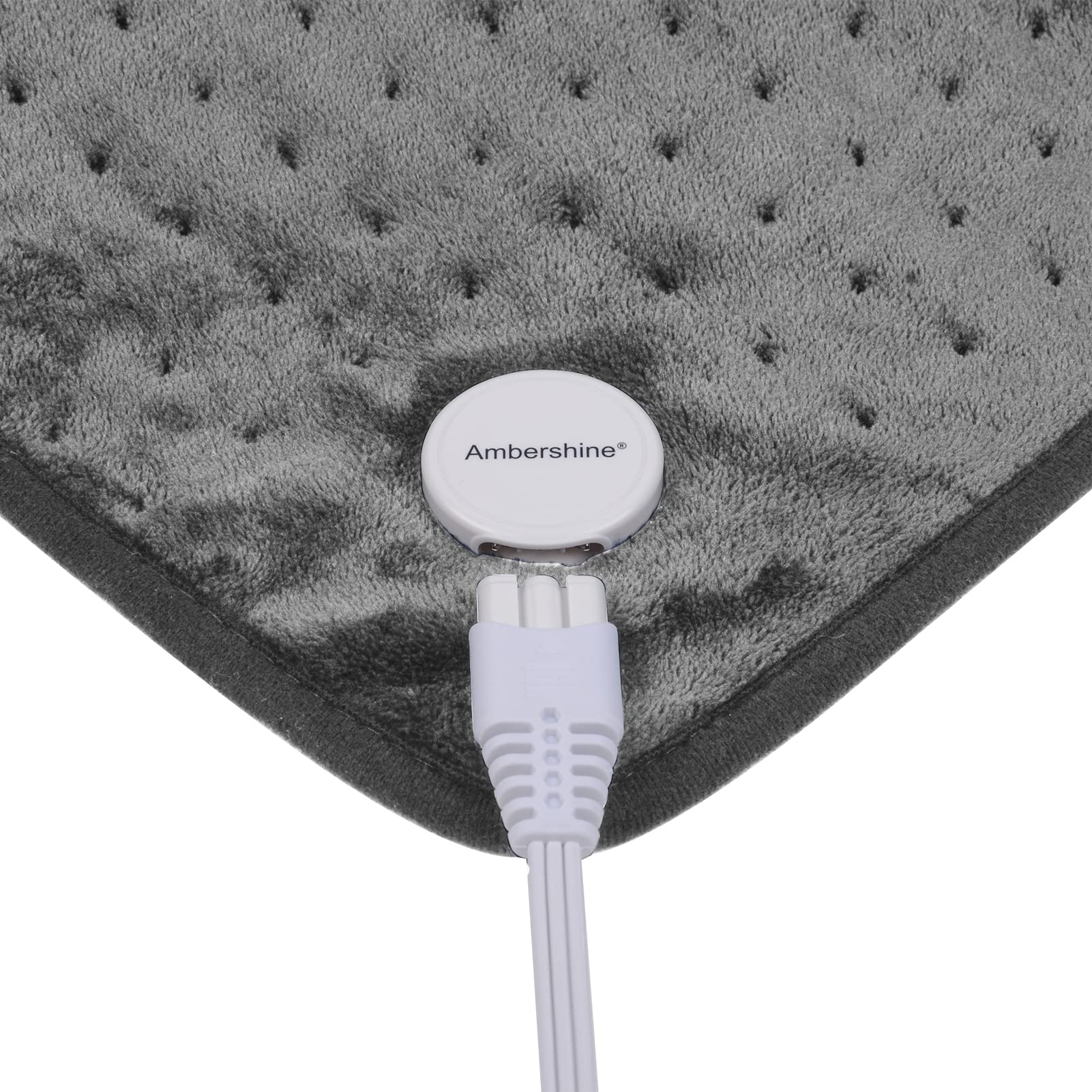 User applying pad to back and shoulders for targeted warmth