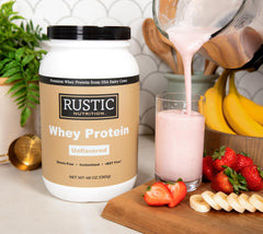 Rustic Nutrition Premium Whey Protein Dissolving in Water demonstrates quick, smooth mixing.