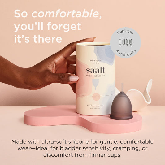 Saalt Soft small grey cup in hand highlights comfortable grip and easy insertion.