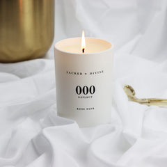 Sacred + Divine 000 angel-number manifestation theme in candle design