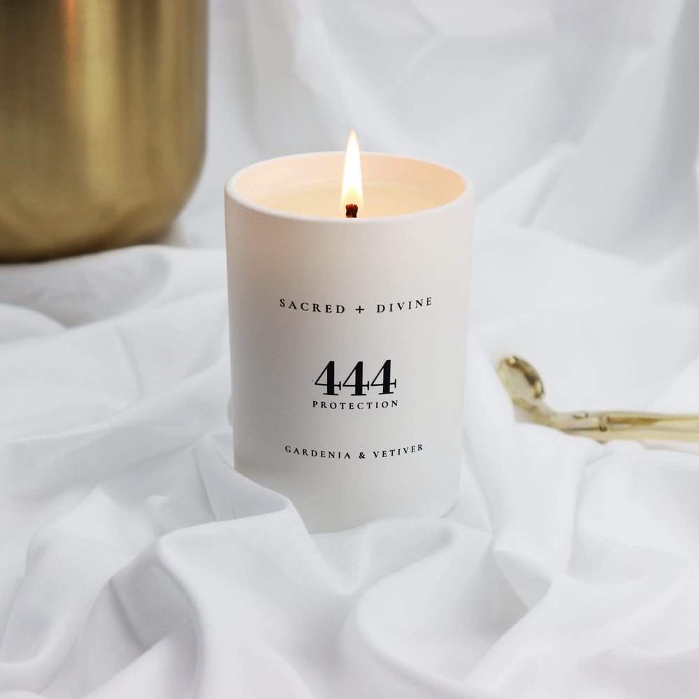 Sleek black gift box from Sacred + Divine candle, ready to share positive energy.