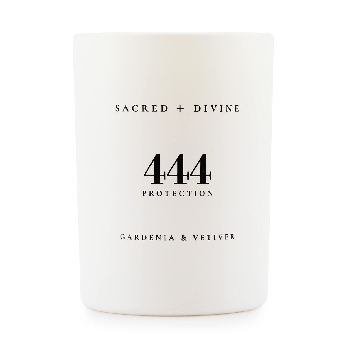 Sacred + Divine 444 protection candle in gardenia-vetiver jar for calm focus.